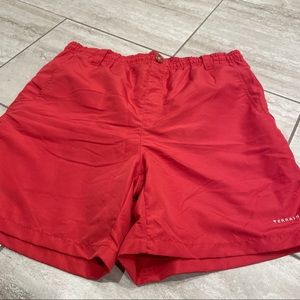 properly tied red fishing shorts / swim trunks